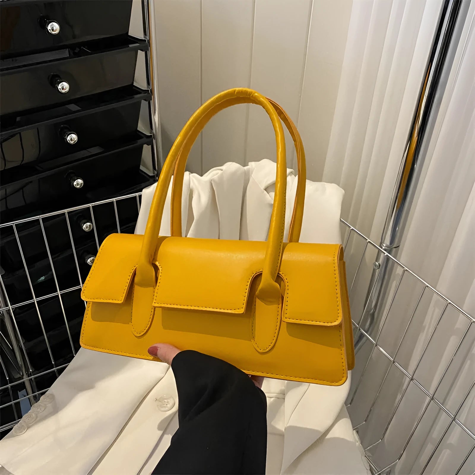 Women's black PU leather small square shoulder bag with stitching details and document compartment