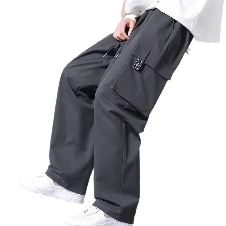 Boys' straight leg cargo trousers with drawstring waist and large pockets in polyester fabric