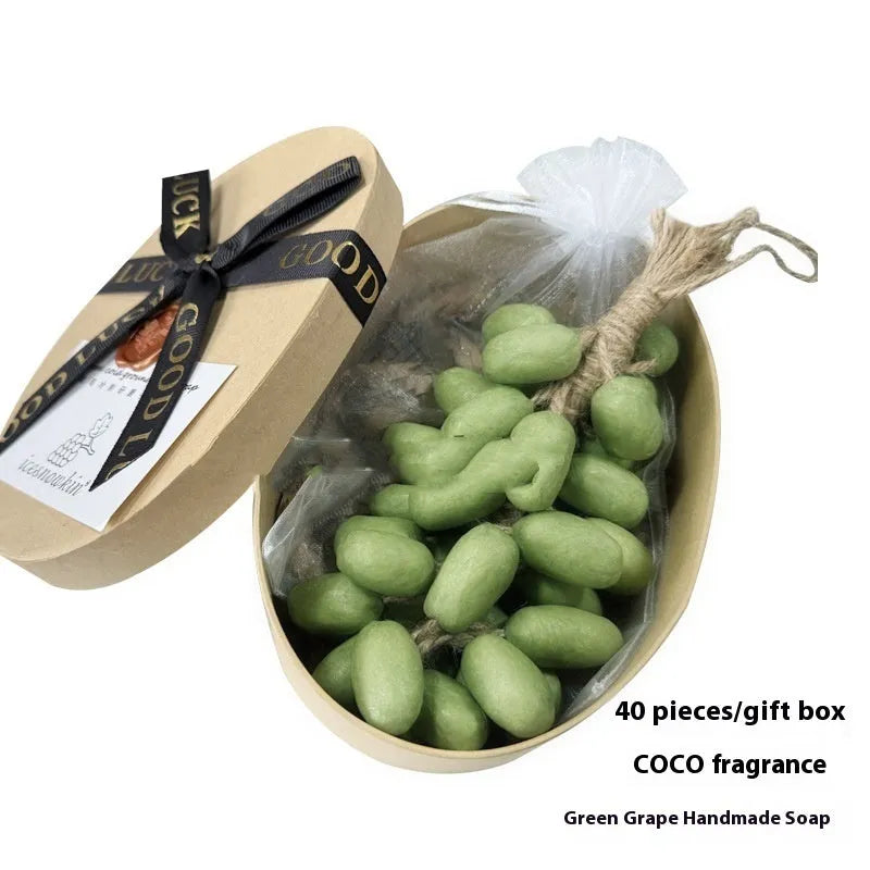 A 120g bar of handmade grape soap with options for black, green, purple, and litchi fragrance.