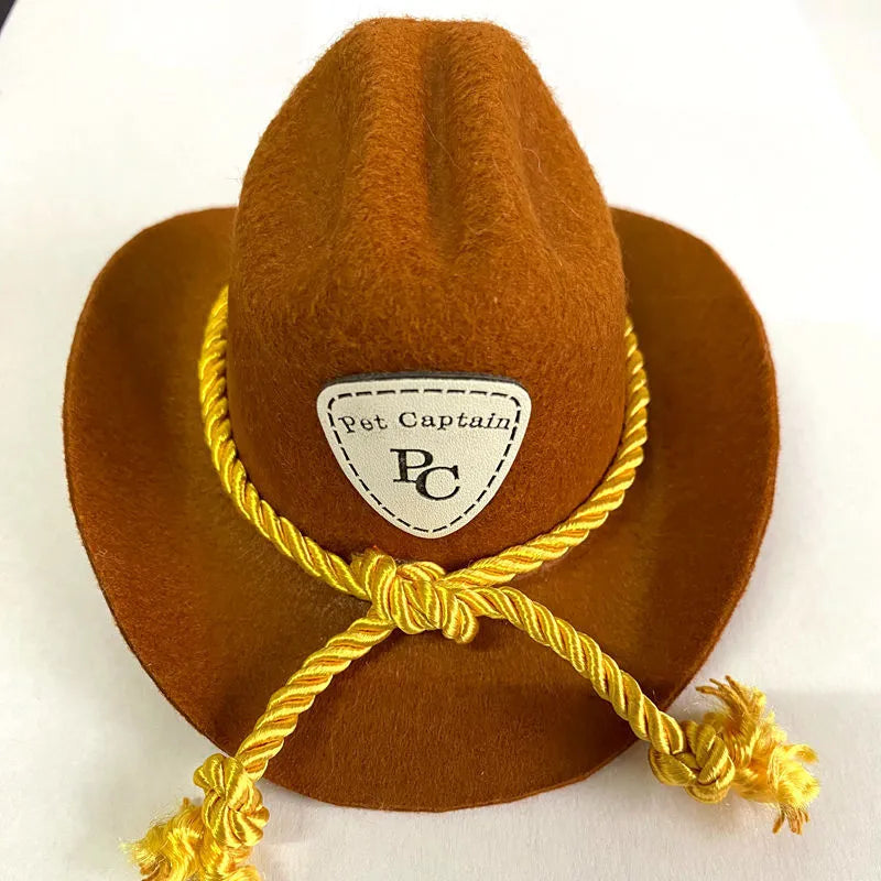 XINGX British cowboy hat for cats in non-woven fabric with decorative ribbon trim.