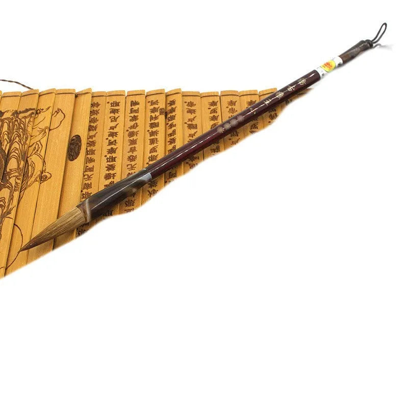 Traditional Chinese wolf hair calligraphy brush with steel rod, shown in large, medium, and small sizes.