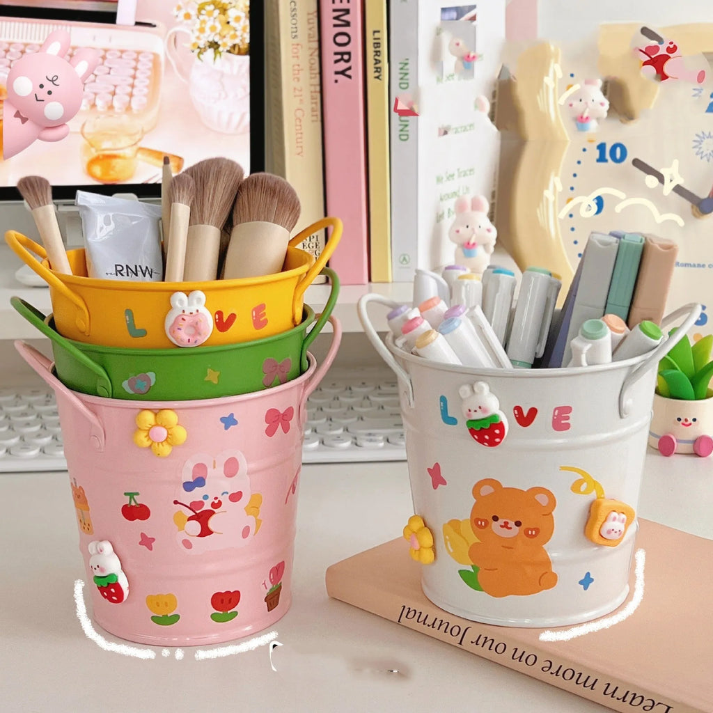 Round metal desk pen holder in various colours with decorative design