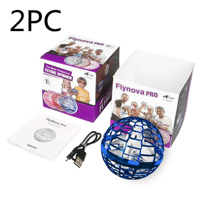 Blue flying ball toy with LED lights hovering above a child's hand next to a magic wand.