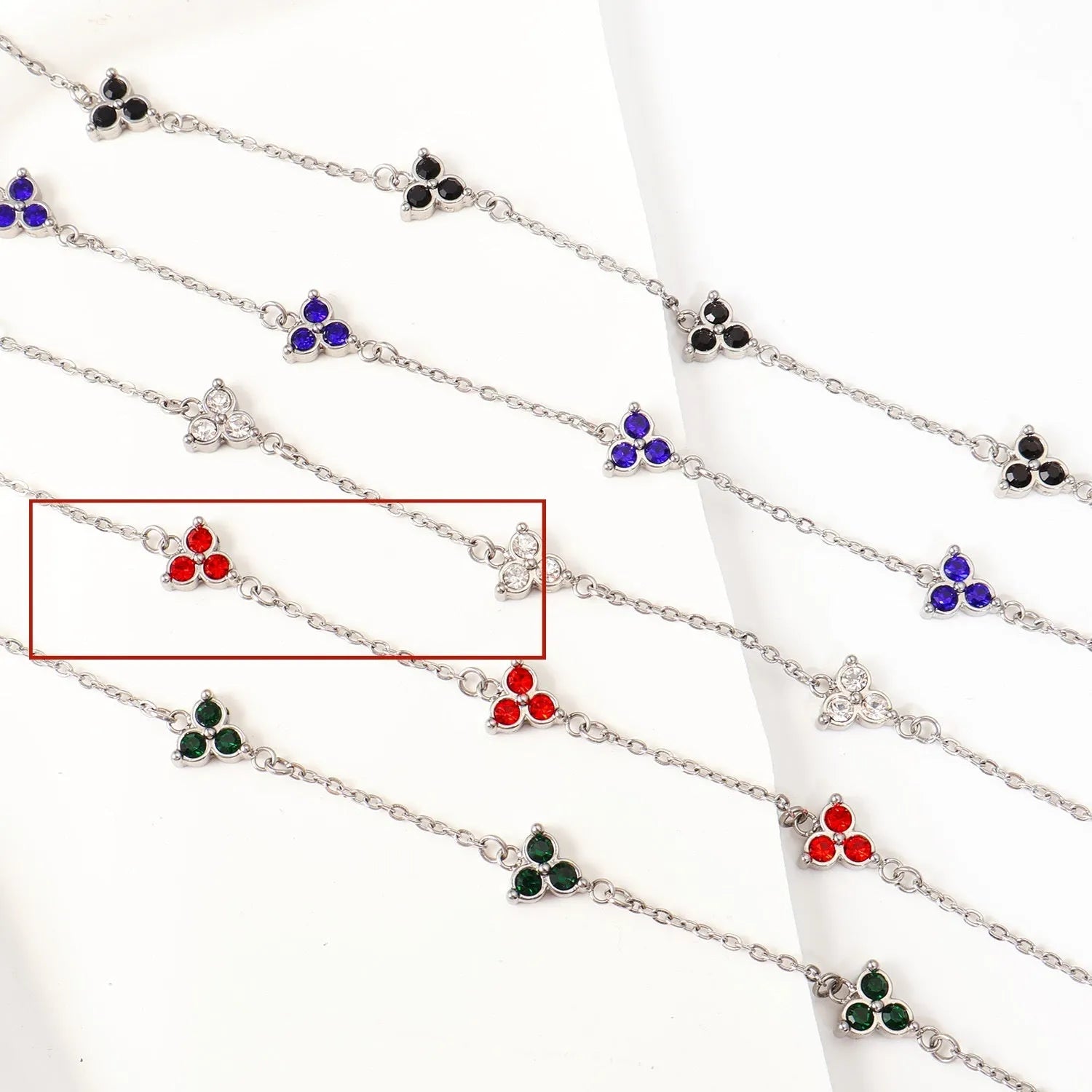 Women's stainless steel bracelet with three geometric diamond designs in various colour options