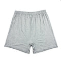 Mannequin wearing solid black high waist modal boxer shorts for men