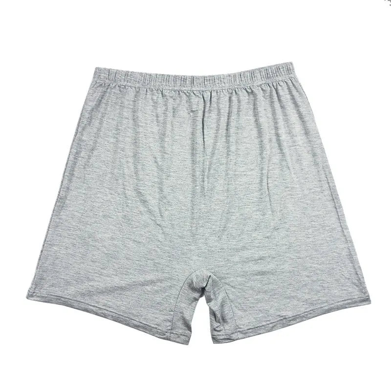 Mannequin wearing solid black high waist modal boxer shorts for men