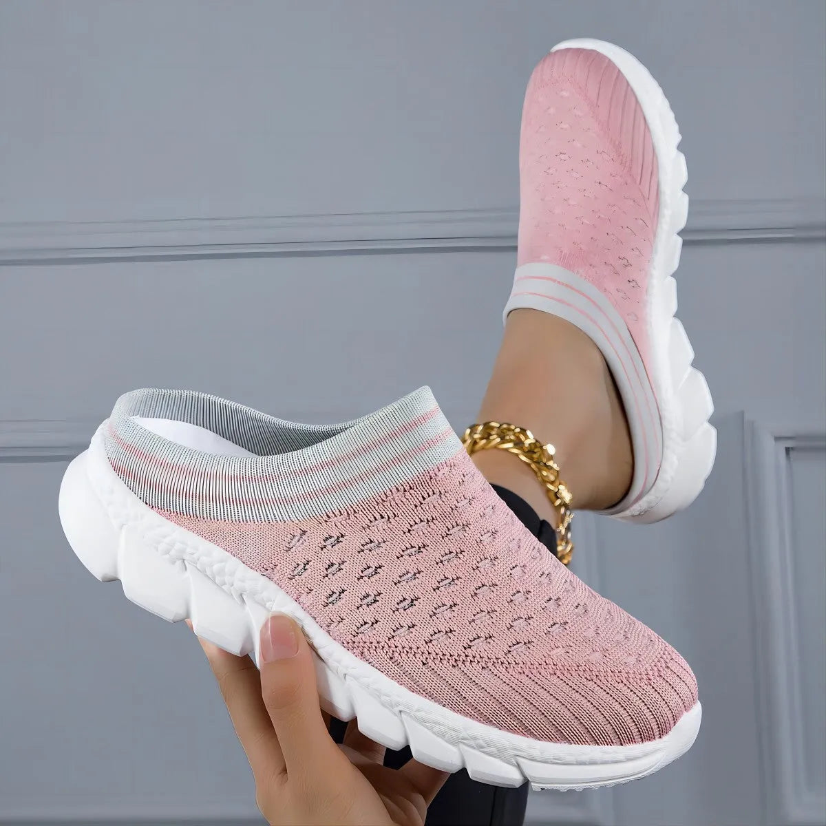 Women's black striped Flyknit socks semi slipper shoes with hollowed-out design and viscose sole.