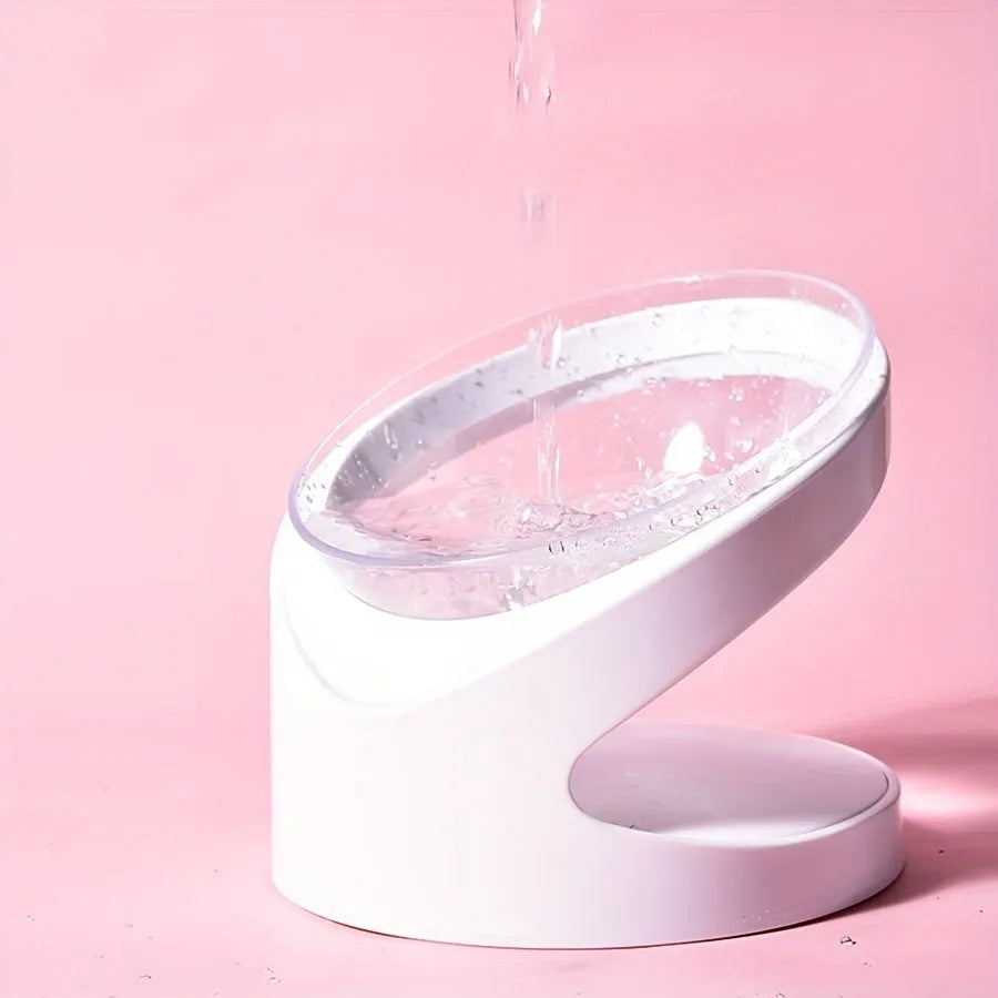 Clear plastic elevated cat food bowl with tilted design for anti-vomit feeding