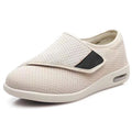 Beige widened fit leisure shoes with Velcro strap and rubber foam sole.