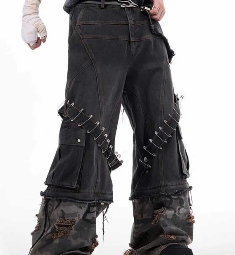 Men's grey camouflage jeans with pin and ribbon splicing detail on the legs.