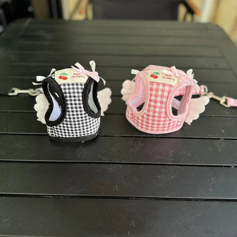 Pink cotton chest-back dog harness with a top handle for a small dog.