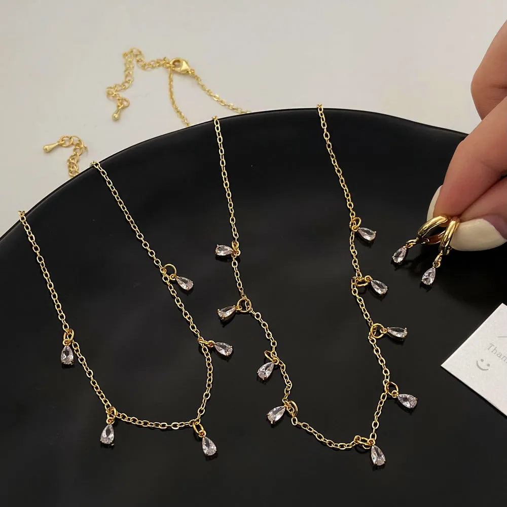 Women's zircon jewellery set with geometric pendant necklace, earrings and anklet