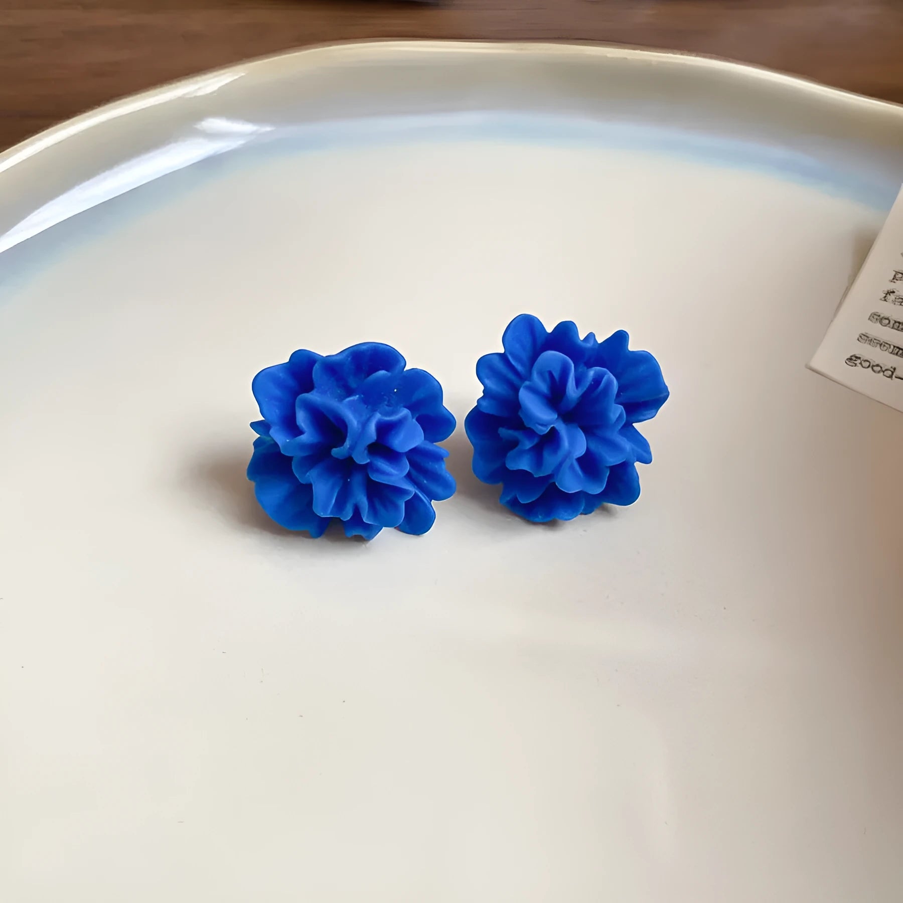 Handcrafted women's geometric cloth earrings with blue resin flower decoration in 30 Silver Needle colour