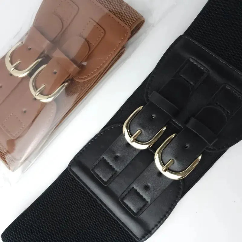 Women's black synthetic leather wide waistband with single loop on a plain background showing elastic construction
