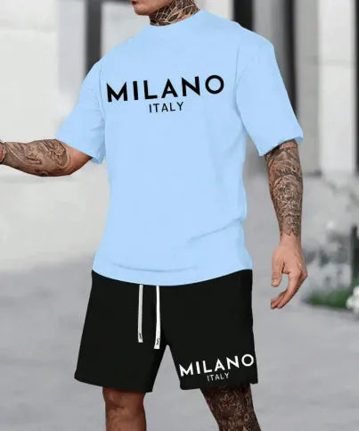 Man's short sleeve polyester pullover top and matching shorts suit set in blue.