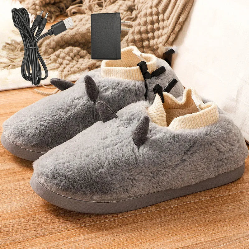 USB electric heating slippers in velvet, showing USB cable connection and adjustable temperature control.