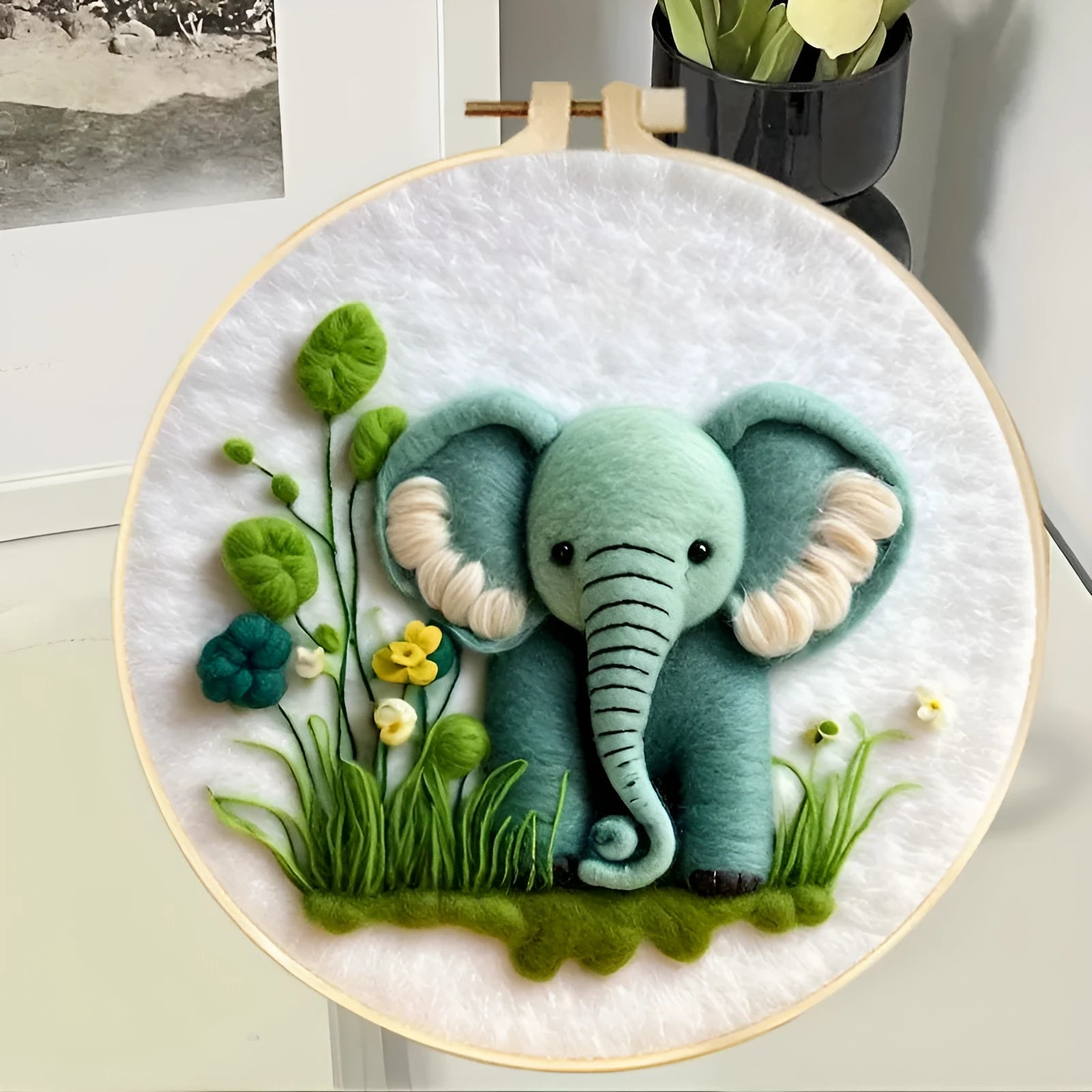 Round linen embroidery kit with wool felt pieces for 3D flowers and leaves, includes a free frame.