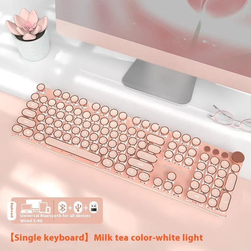 Matcha green mechanical gaming keyboard with white backlighting, aluminium panel, and multifunction knob on desk