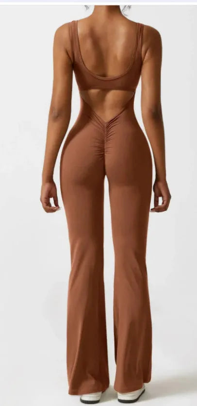Women's tight seamless yoga bodysuit with hollow-out design and chest padding in black colour