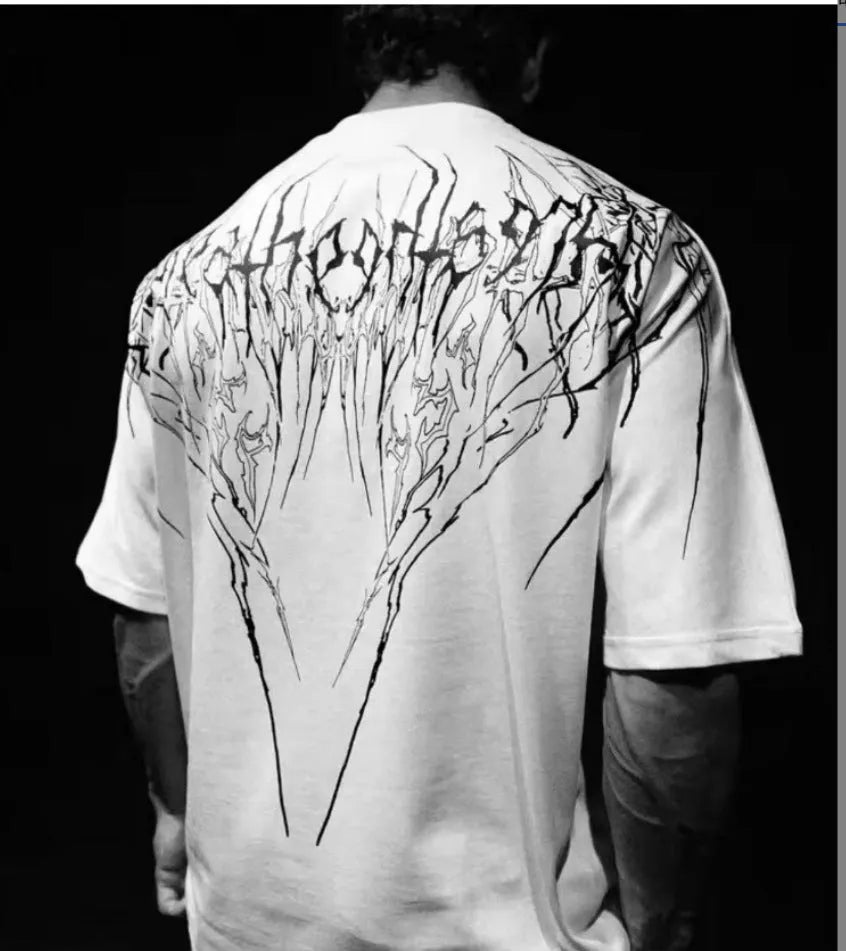 Dark style loose plus size cotton short-sleeved T-shirt with gilding decoration, shown in one of ten available colours.