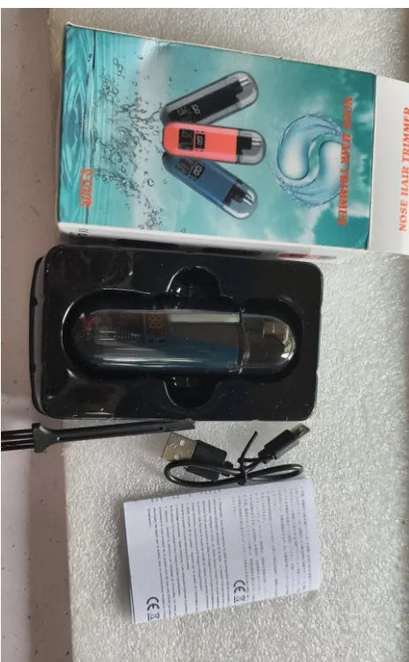Rechargeable nose hair trimmer with digital display and removable stainless steel cutter head