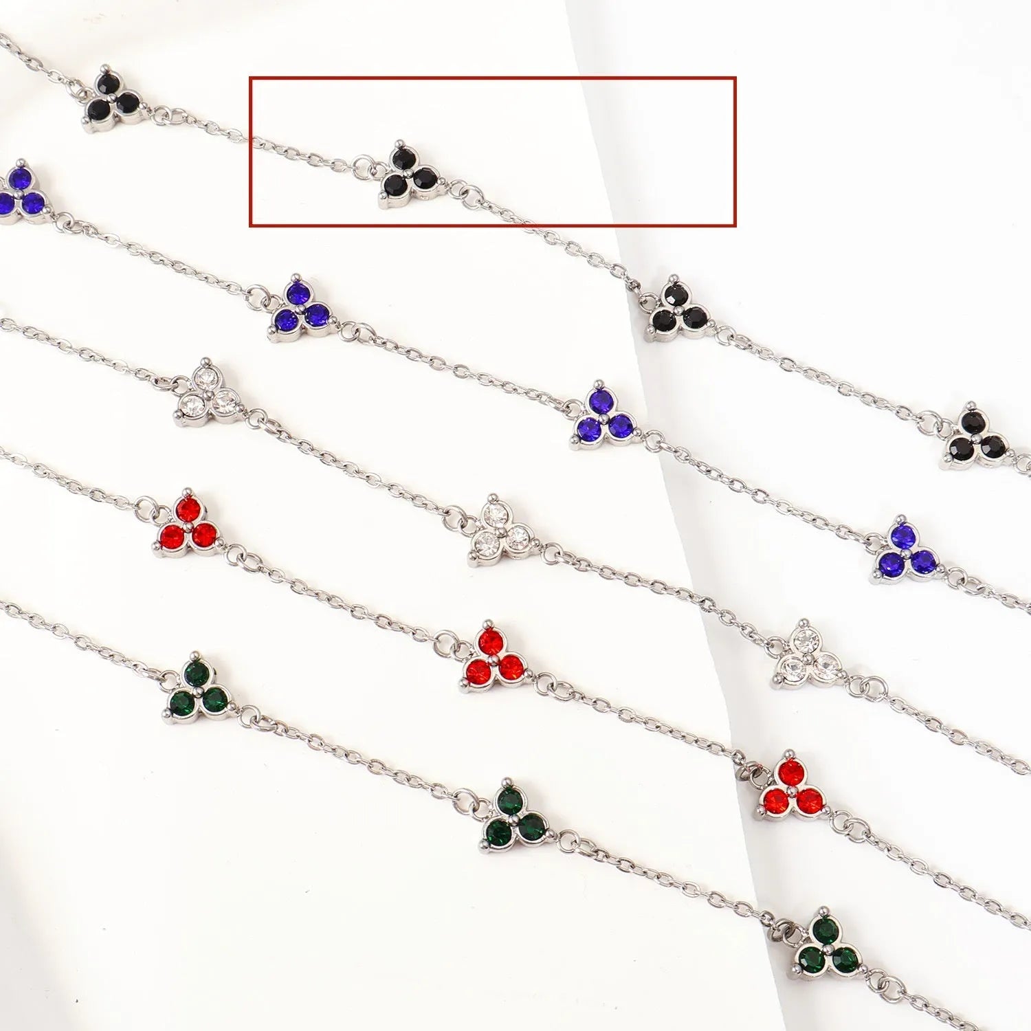 Women's stainless steel bracelet with three geometric diamond designs in various colour options