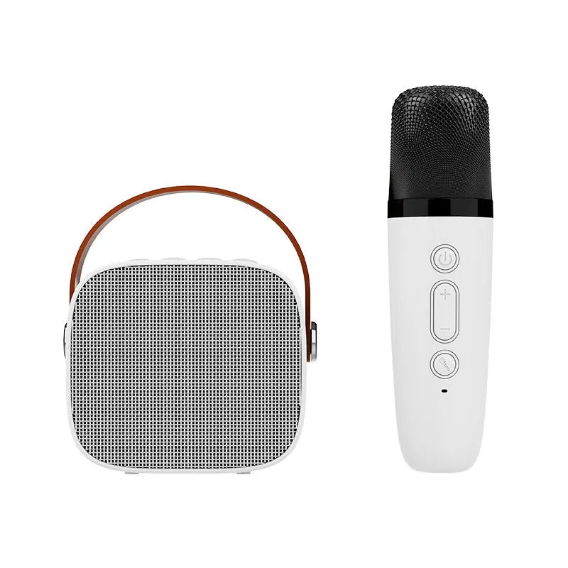 Compact white wireless Bluetooth speaker with microphone, showing USB port.