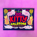 Cat Calendar Wall Planner for 2024 or 2025 with seasonal designs on paper.