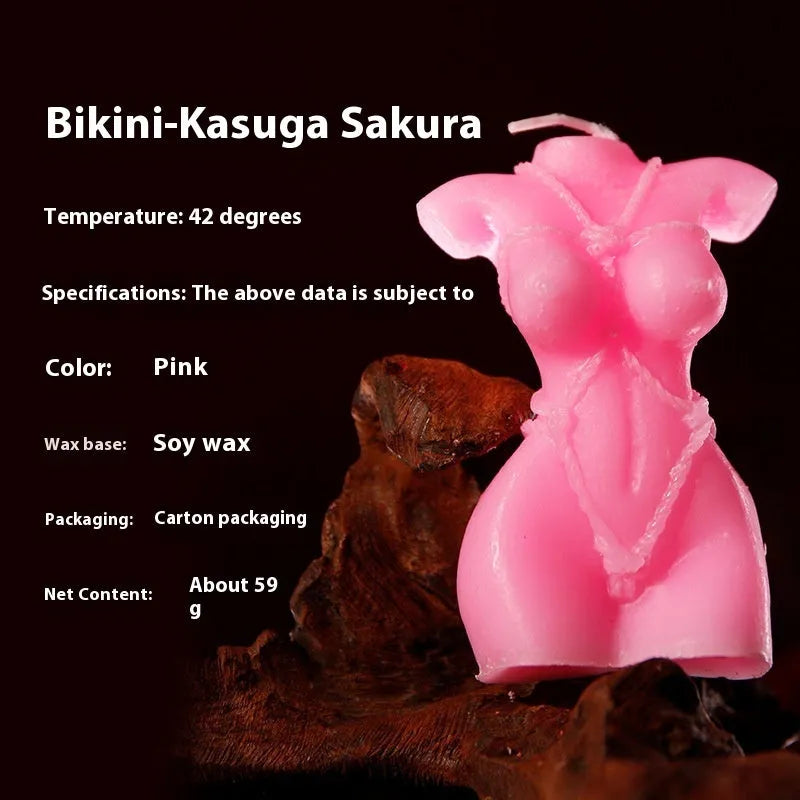 Low temperature soy wax candle in bikini shape, colour options: red, pink, purple.