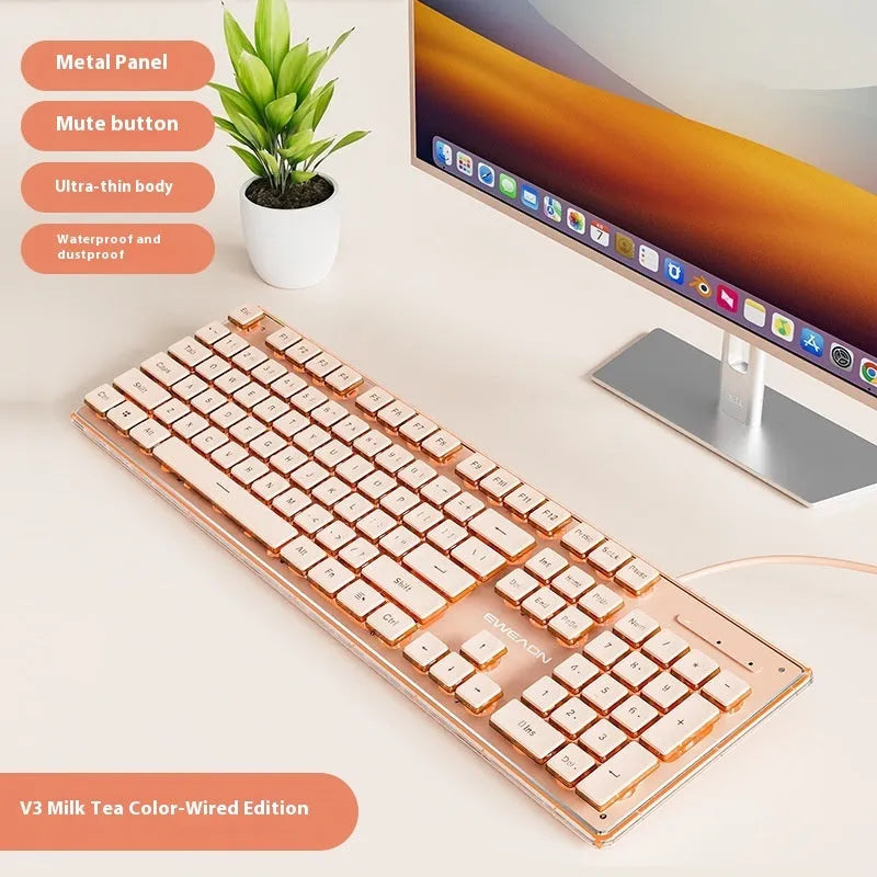 Prewalker V3 retro green coloured quiet keyboard and mouse set on a desk