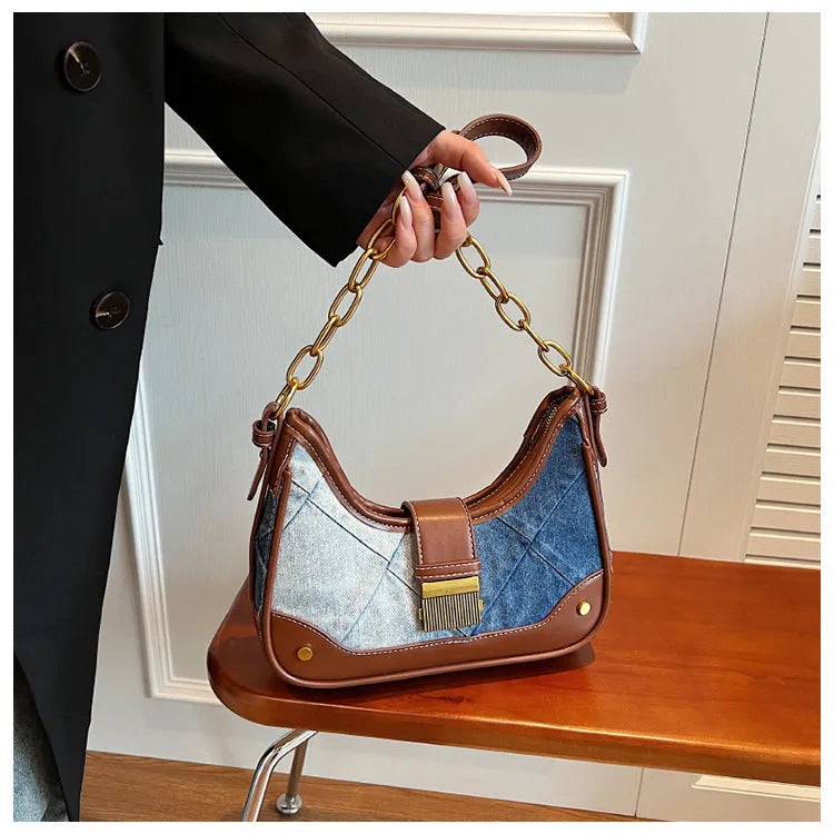 Brown denim women's shoulder bag with diamond mesh and chain details showing internal mobile phone pocket