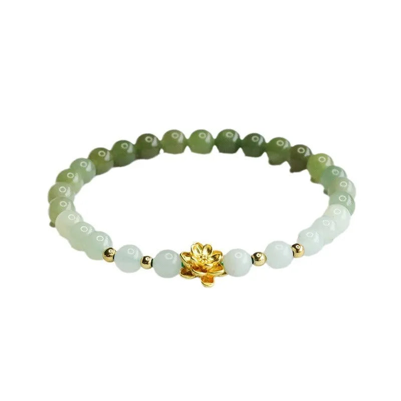 Hand-woven clear water gradient Hetian jade bracelet with flower-shaped beads on a white background.