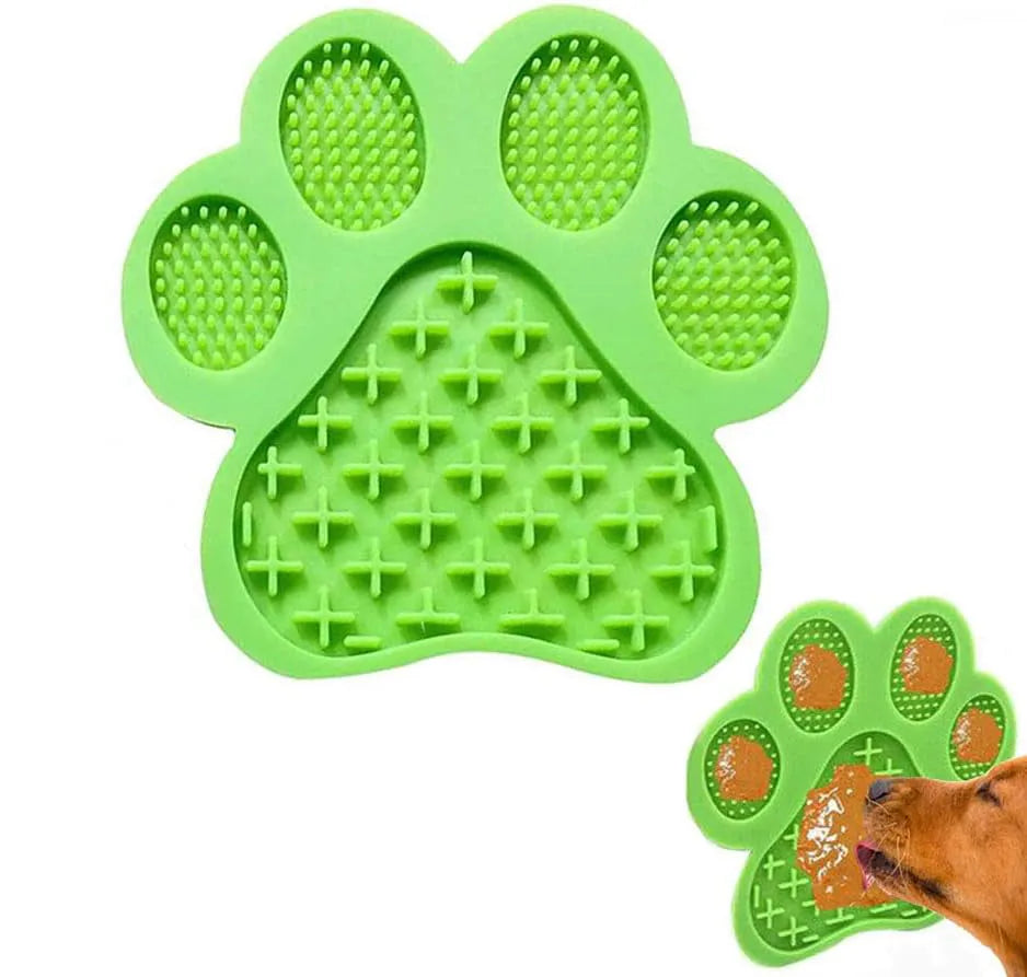 Blue bone-textured silicone dog licking mat with suction cups on a white tile background.