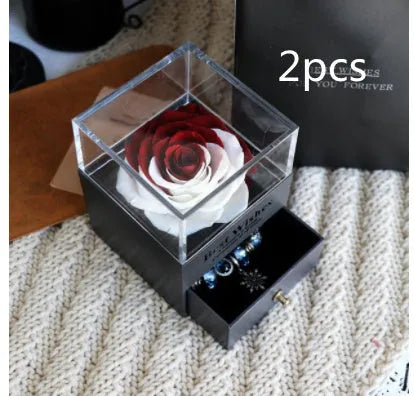 Eternal Flower gift box with preserved roses and carnations inside, measuring 8.5 cm square by 10.5 cm high