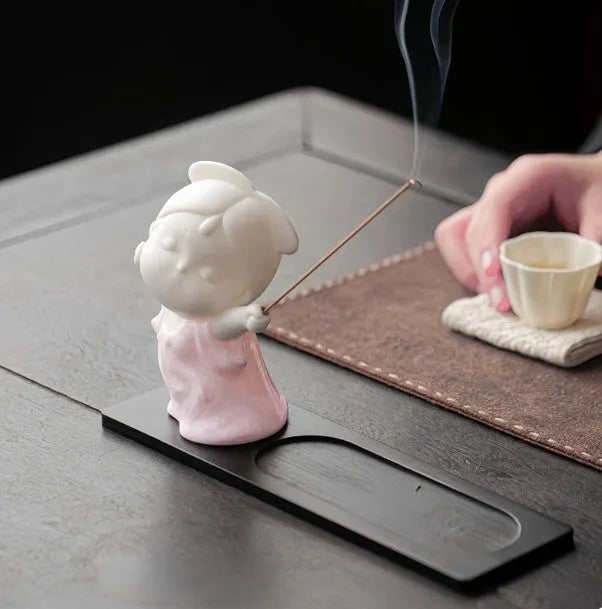 Small ceramic female court attendant figurine incense burner decoration in a cute style.