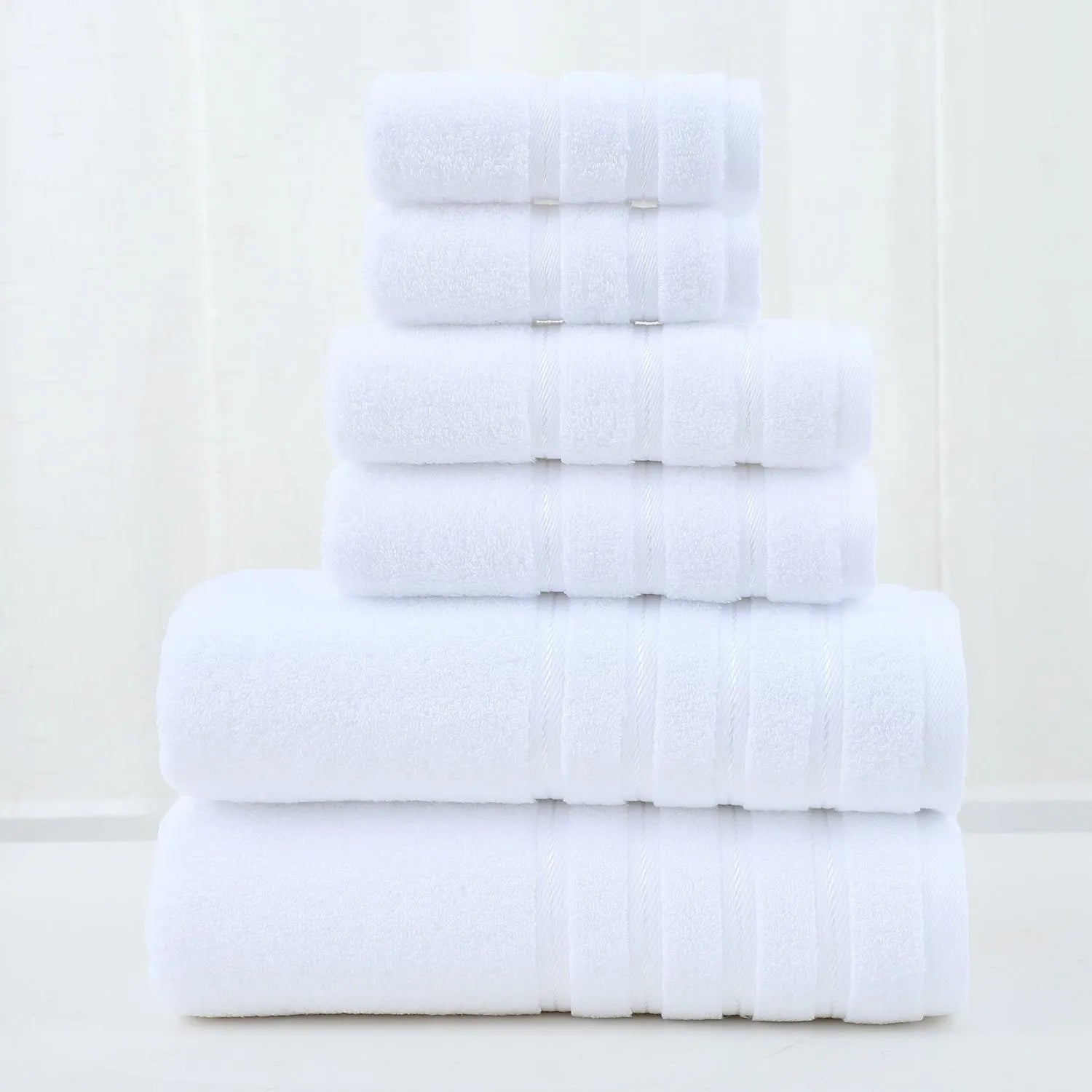 Combed cotton towel six-piece set with twill weave in multiple colours including white, black, and avocado green.