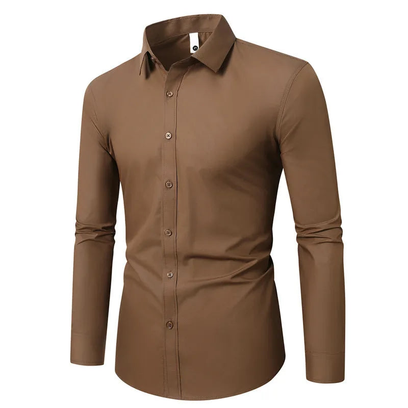 Man wearing a loose-fit linen long sleeve shirt in a neutral colour, showing the slim profile and button front.