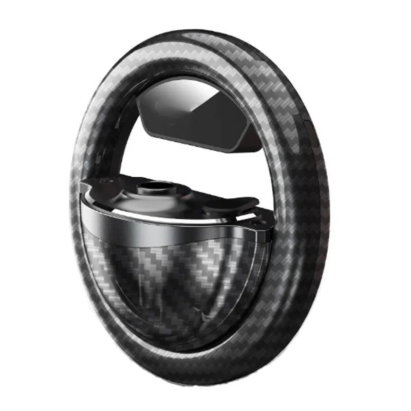 Black aromatherapy LED rhythm lamp with USB Type-C cable and essential oils on a table