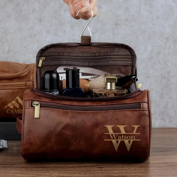 Men's personalised PU leather travel bag shown in four colour options: black, light brown, brown, dark brown.