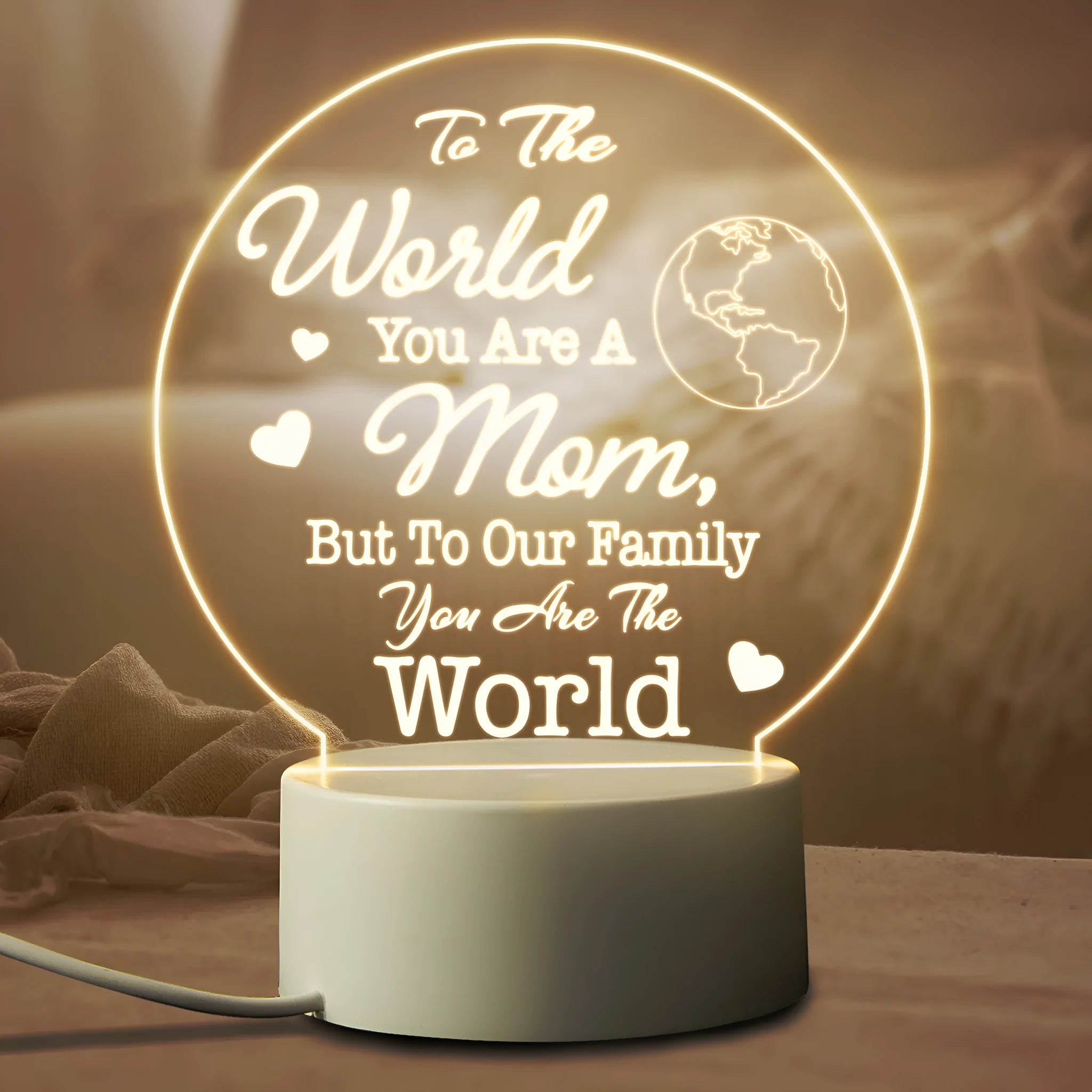Modern white bedside night light with acrylic shade on ABS base, connected via USB cable.