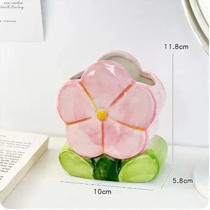 Ceramic flower pattern pen holder storage box on desk showing blue floral design