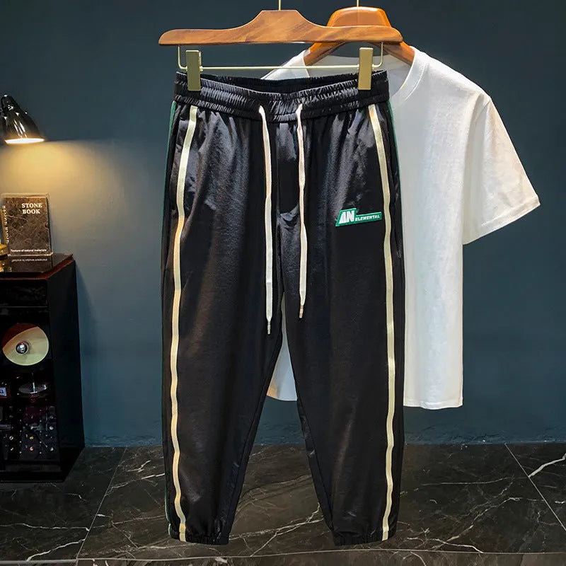 Men's solid colour cotton harem pants in mid-waist design