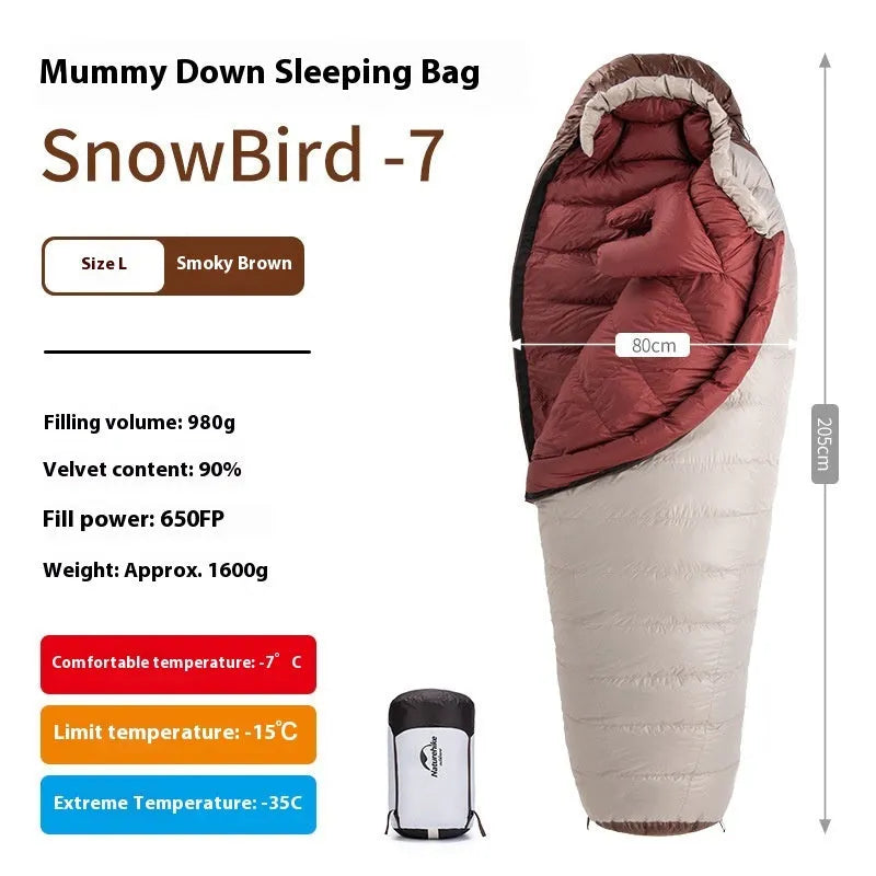 Goose down mummy style sleeping bag for adults with a storage bag.