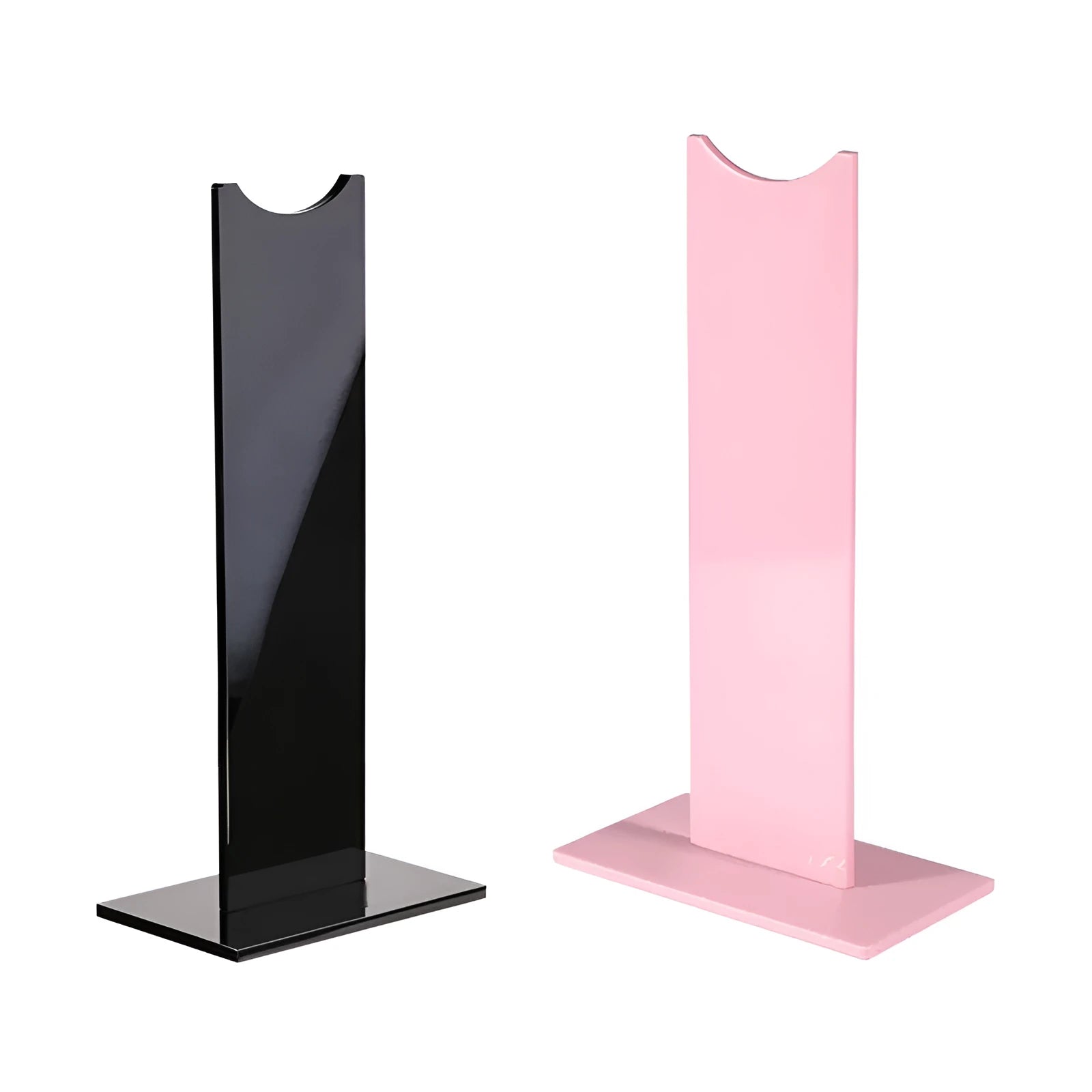 Pink and black detachable headset bracket with a non-slip silicone base on a desk