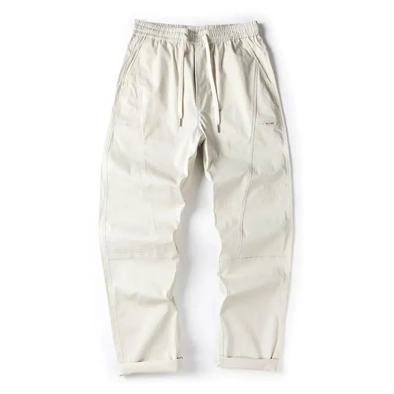 Women's milky white cotton wide-leg casual trousers with an antibacterial feature on a hanger.