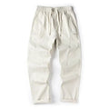 Women's milky white cotton wide-leg casual trousers with an antibacterial feature on a hanger.