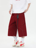 Retro denim workwear shorts with multiple pockets in wide leg cropped design