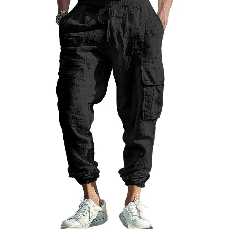 Men's linen casual trousers with ankle-tied design and multiple pockets in army green colour.