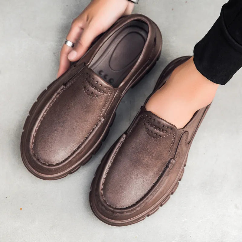 Men's black slip-on platform shoes with an artificial leather upper and a thick EVA sole.