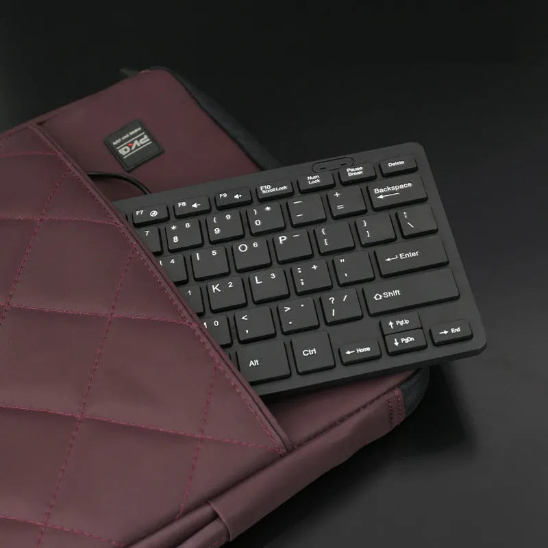 Compact USB wired keyboard in black, white, pink or blue colour with 1.3 metre cable